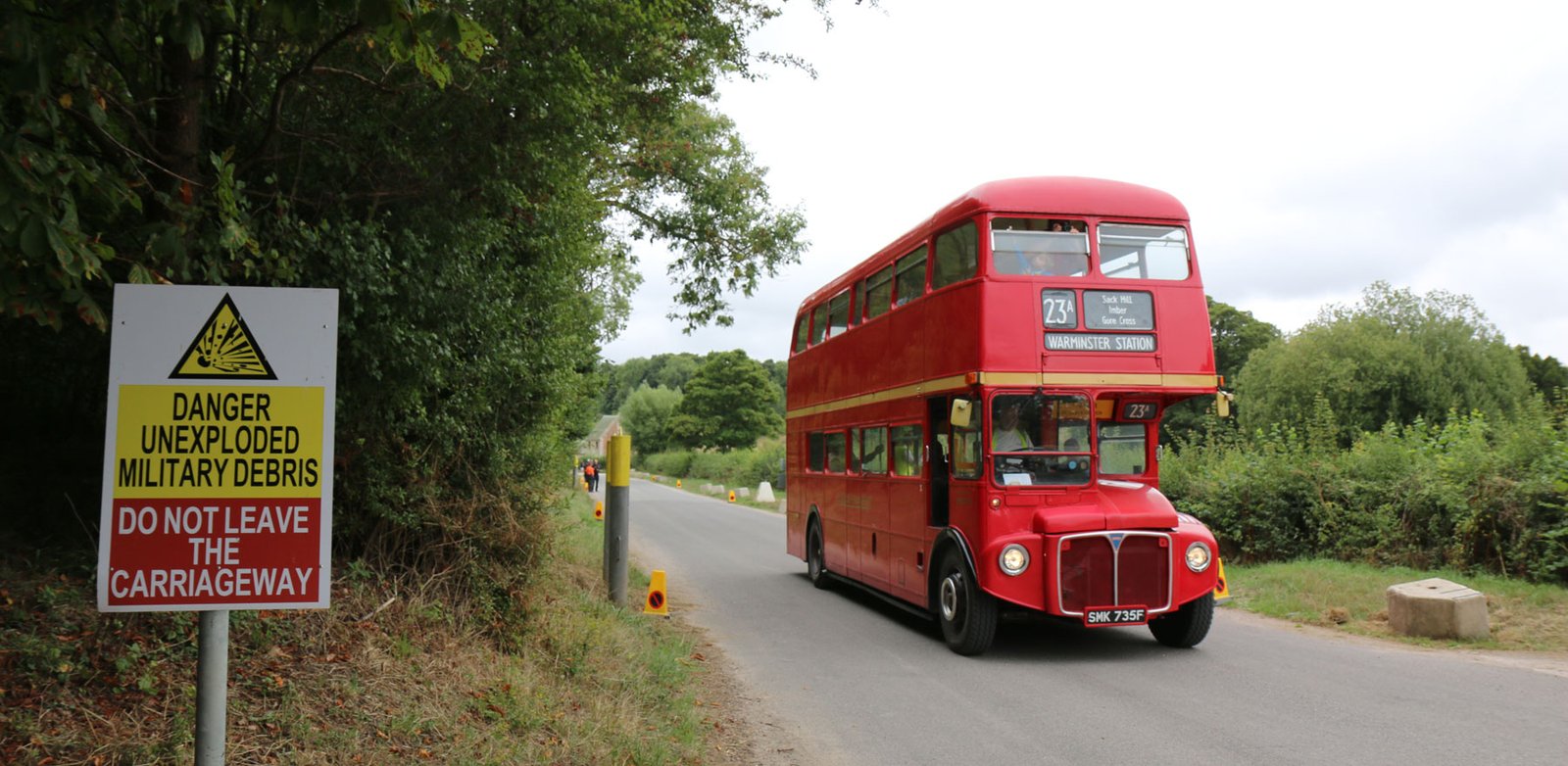 Traditional UK bus in village